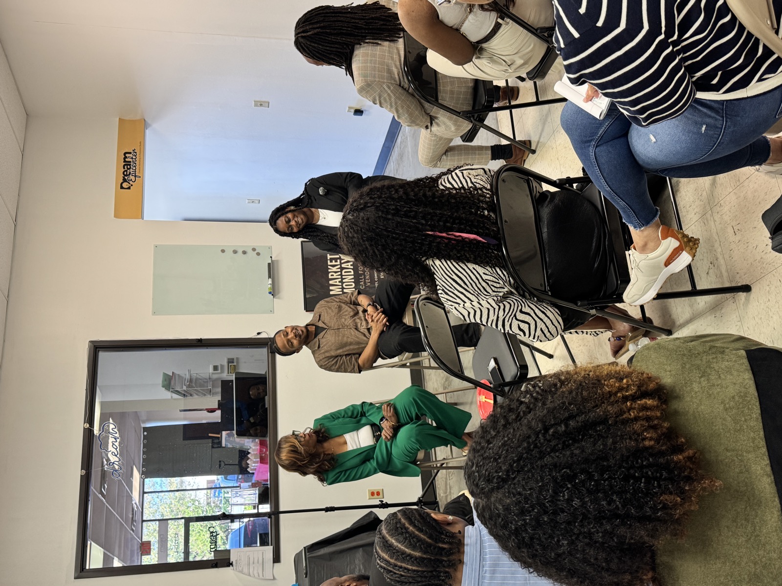 Community workshop and panel at Dream Epicenter with Market Monday vendor signage