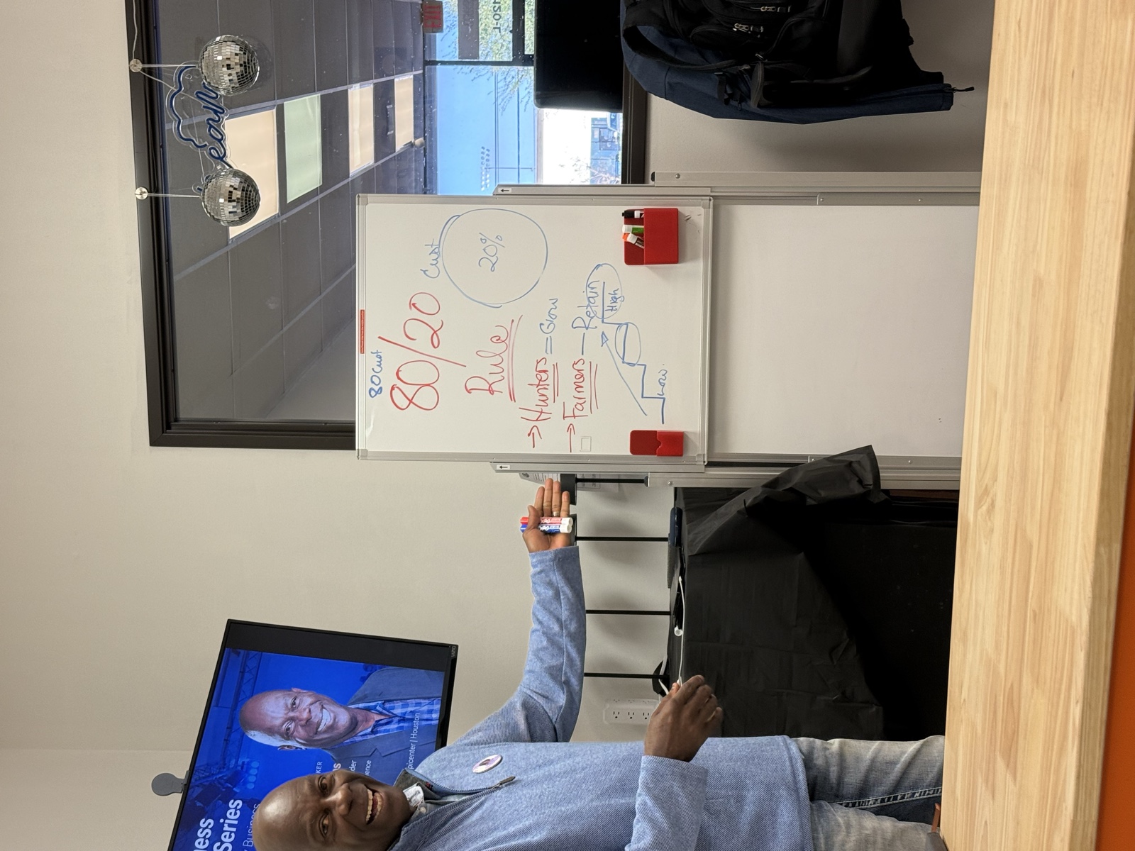 Residency instructor teaching in front of a whiteboard framework session at Dream Epicenter